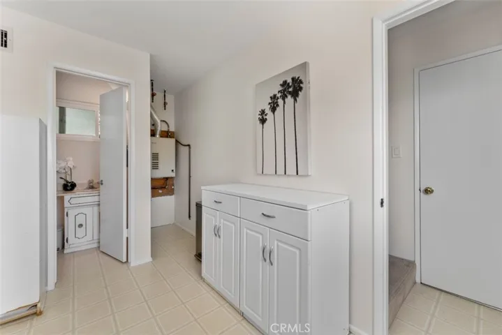 This well-designed space is perfect for all your storage needs, and organizing household essentials. Enjoy the convenience of direct access from the garage, making grocery trips a breeze!