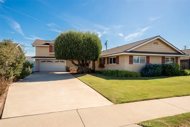 Welcome to 4672 Santa Fe Street! This home lives like a single-story residence, offering the convenience of four spacious bedrooms located on the main level. A fifth bedroom upstairs provides extra privacy and versatility.
