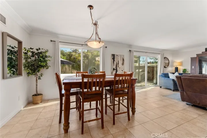 Enjoy the bright ambiance from the large windows that overlook the backyard