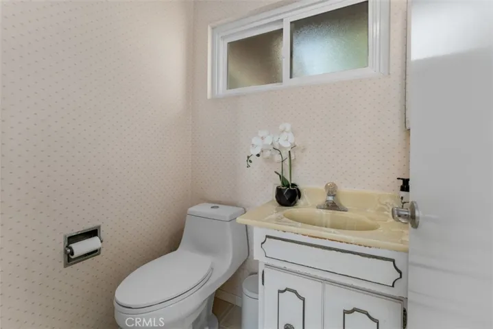 Functional utility room bathroom designed for convenience