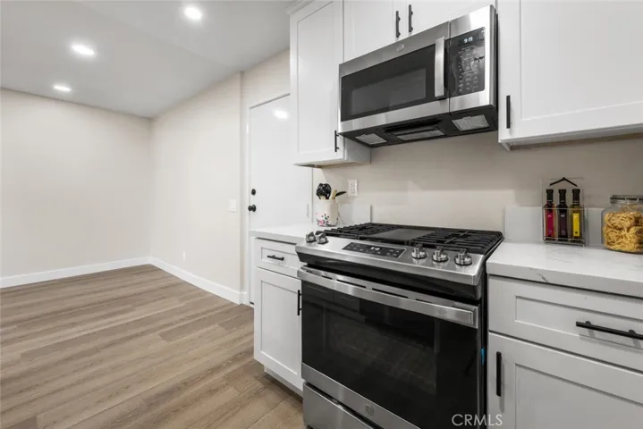 Appliances include range, microwave, dishwasher, and garbage disposal.
