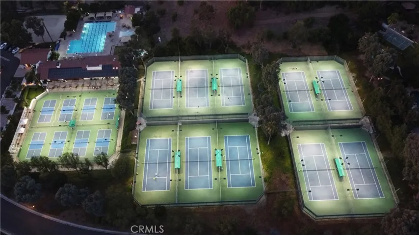 The Nellie Gail Tennis and Pickleball Clubs are nearby