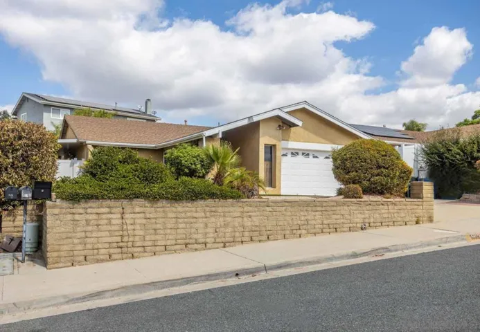 Front yard has room to play, relax, garden...