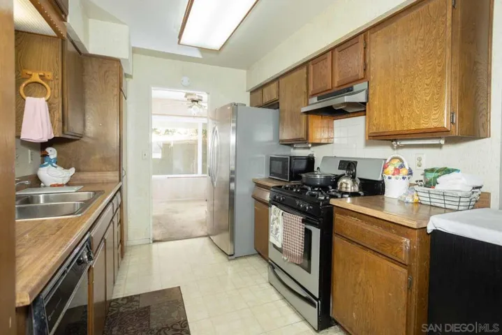 Kitchen has a view to the side patio. Easy access to the dining room, living room or outside on the patio.