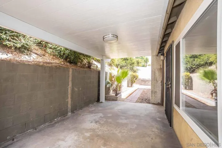 Second of two covered patios. Very private space.