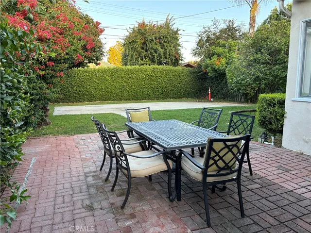 Backyard view from lovely brick patio