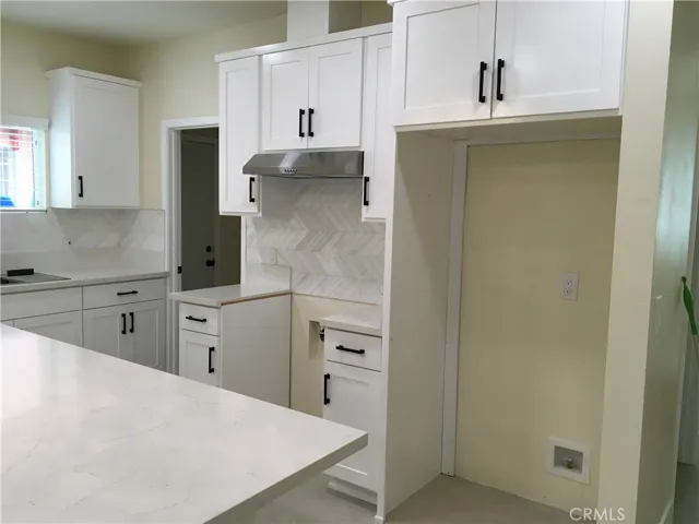 Will accommodate a 5’10” fridge