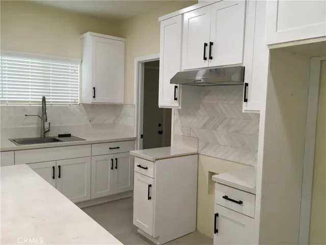View of kitchen island in the foreground