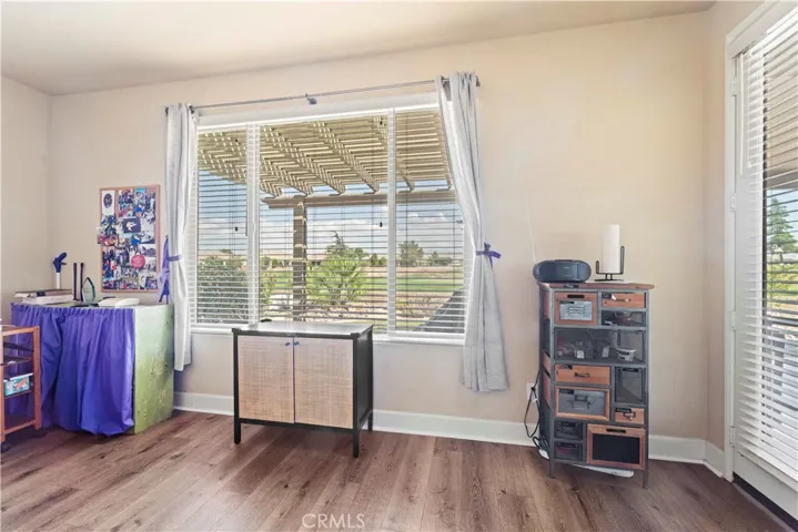Primary bedroom with golf course view