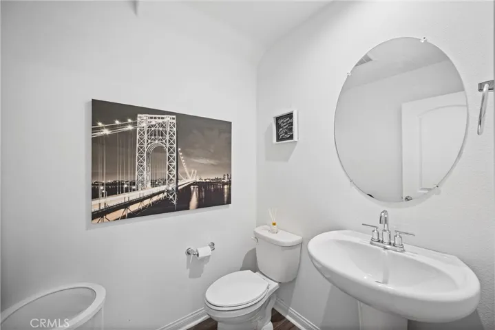 Downstairs half bath for visitors close to Living and Family room area.