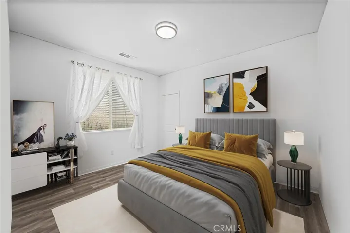 Downstairs bedroom, virtually staged.