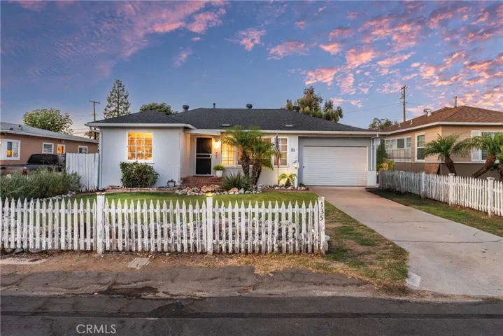 Cute as a buttom with 1 car garage and driveway