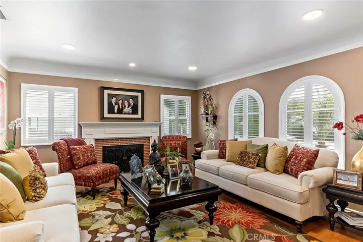Living Room Arched Windows with Shutters
