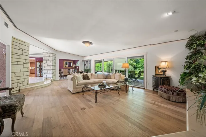 A peek of the living room with the entry on the left.