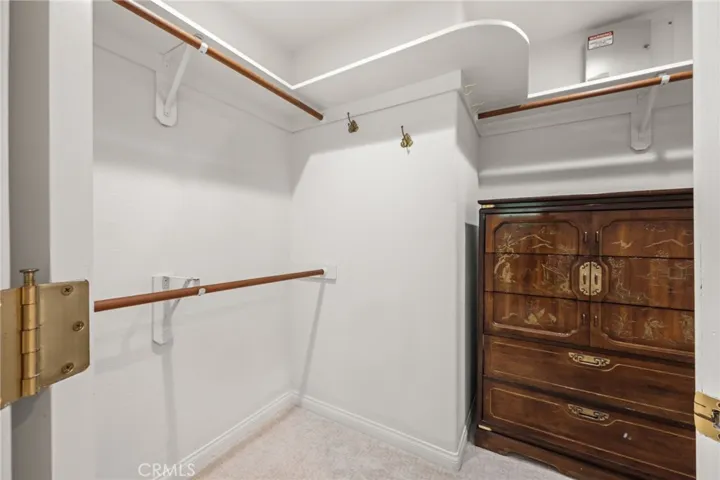 Here is the 2nd of the walk-in closets in the primary bedroom.