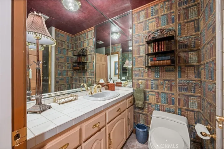A bathroom with a shower located behind the door