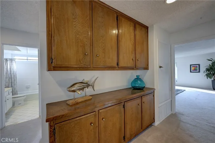 Upstairs storage cabinets.