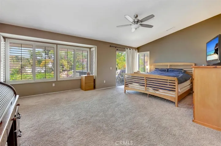 Primary suite with high ceilings, ensuite bath and view balcony