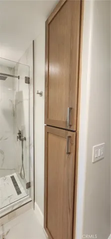 BUILT IN LINEN CLOSET IN MASTER BATHROOM