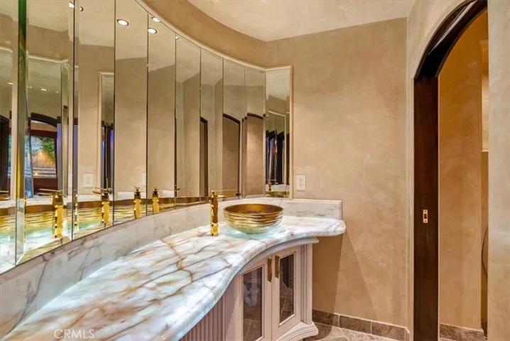 Downstairs Powder Bath (Entertainment Suite Level)