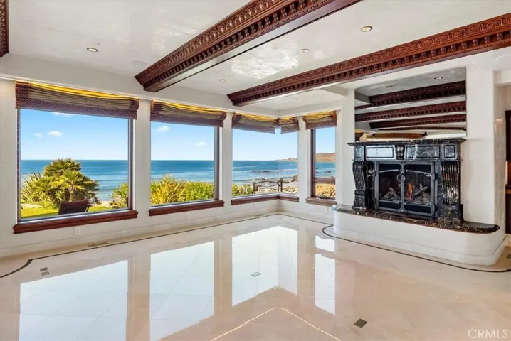 Sweeping panoramic views of the Pacific Ocean are immediately evident.