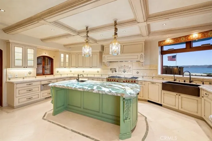 Wolf Range & warming drawer, dual Sub Zero refrigerators & a Bosch dishwasher