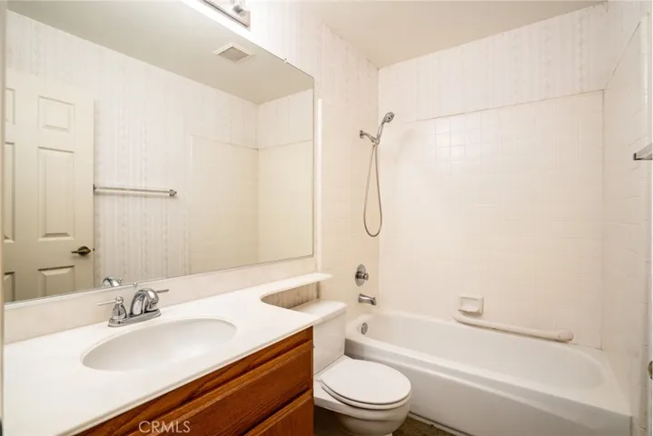 Primary Bathroom with Combination Tub and Shower