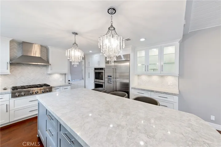 Subtle Lighting Elegance Gleams off the Stainless Finishes and polished stone counters