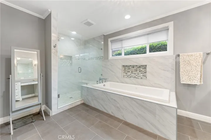 Seriously, this 4th bedroom was transformed into a Luxurious Spa Experience for Two, complete w/separate Shower Enclosure & Deep-Soak Jet-Tub wrapped in Classic Quartz all on Gray Stone Flooring
