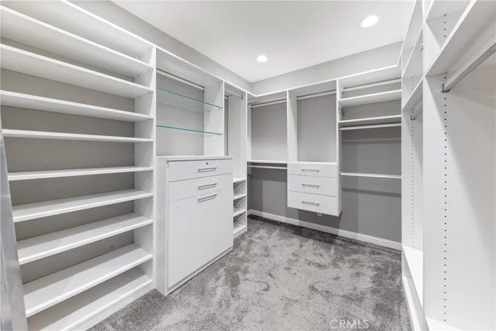 You want storage? You want closet space? You want both?  Ok ok Here you go! This Extra Large Walk-in was once a closet & the master bathroom.