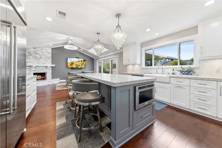 Large Center Island offers built-in MW and Guest Seating that extends the length of this Amazing Kitchen