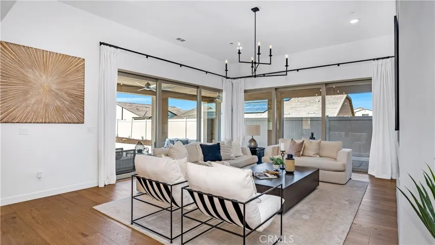Wrap-around covered patio, enhancing the indoor-outdoor living experience.
