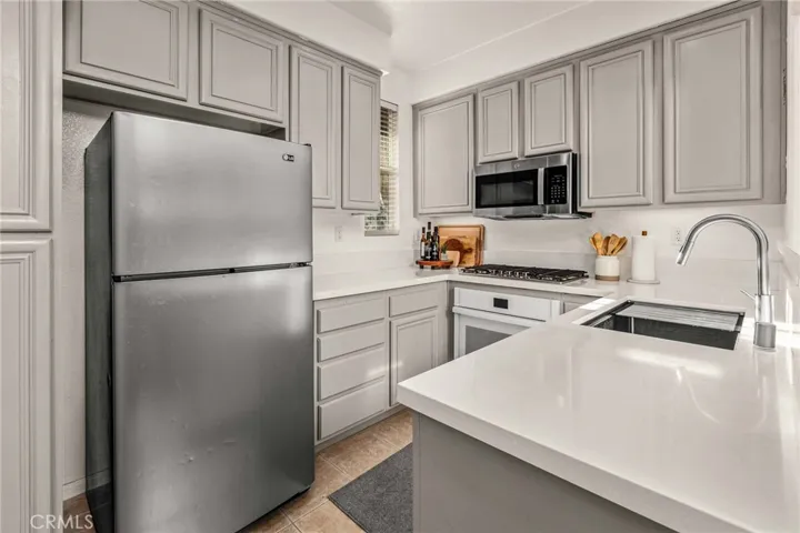 Modern kitchen with updated counters and appliances