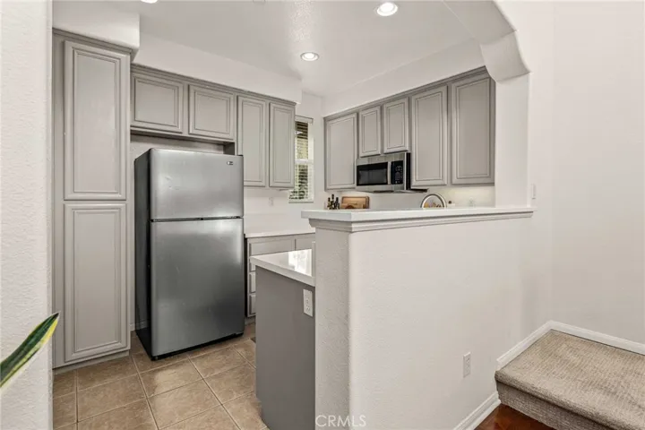 Modern kitchen with updated counters and appliances