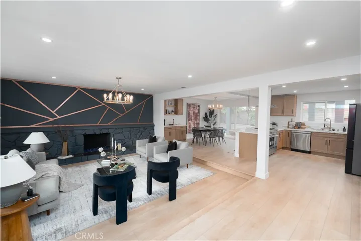 Open Floor Plan - ALL New Flooring, Paint, New Kitchen, Custom Cabinets, New Appliances Including Refrigerator and Top of the line Gas Stovetop