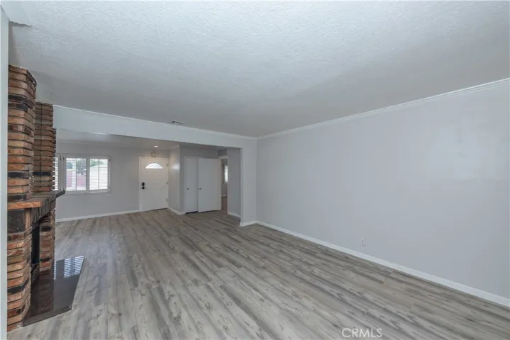 View of the family room with the upgraded flooring