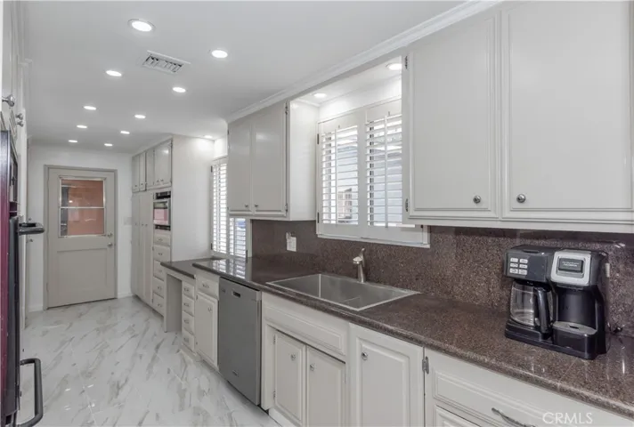 Another view  of the kitchen