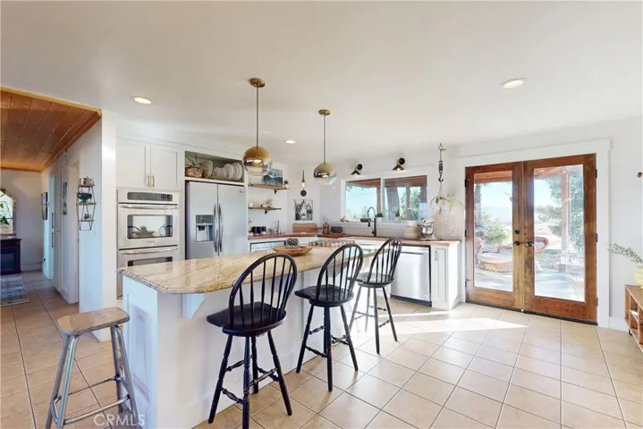 Large center island with granite counter top