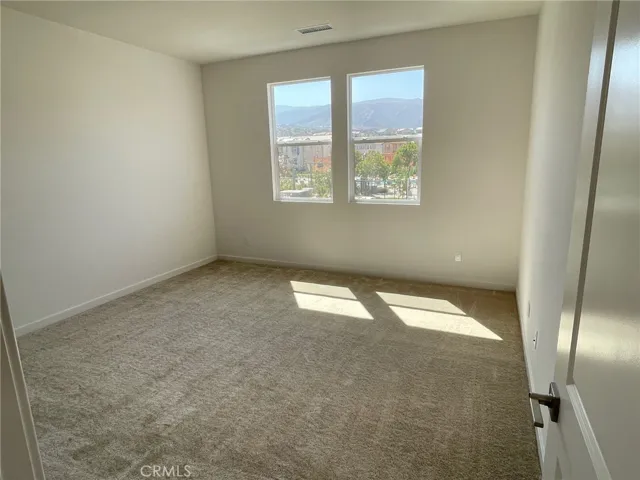 Primary Bedroom with view of Mountains