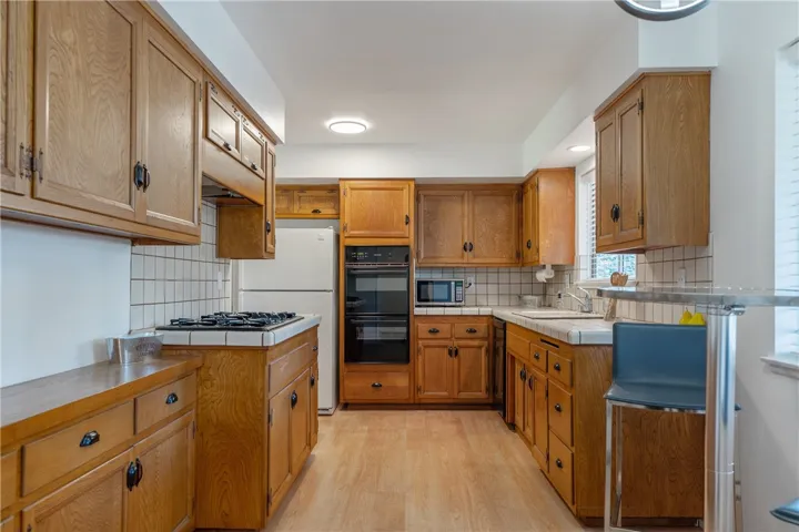 Large kitchen with ample storage.