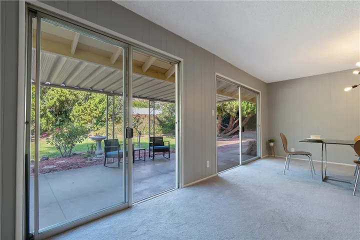 Dual sliders to backyard.
