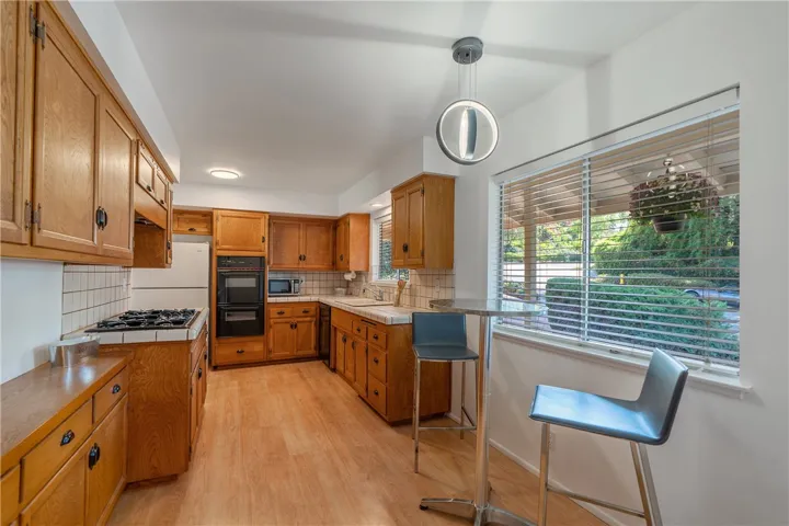 Large kitchen with ample storage.