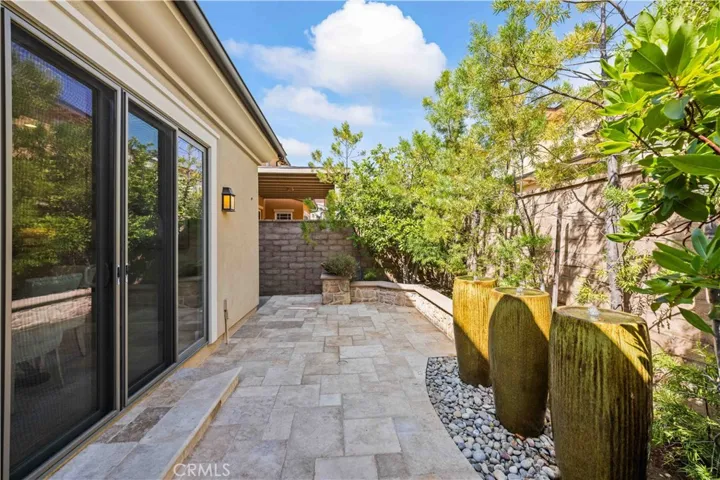 Outdoor artscape space with water fountains and fireplace