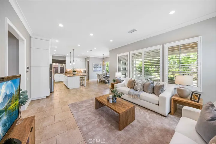 Open floor plan great room flows into kitchen & conservatory