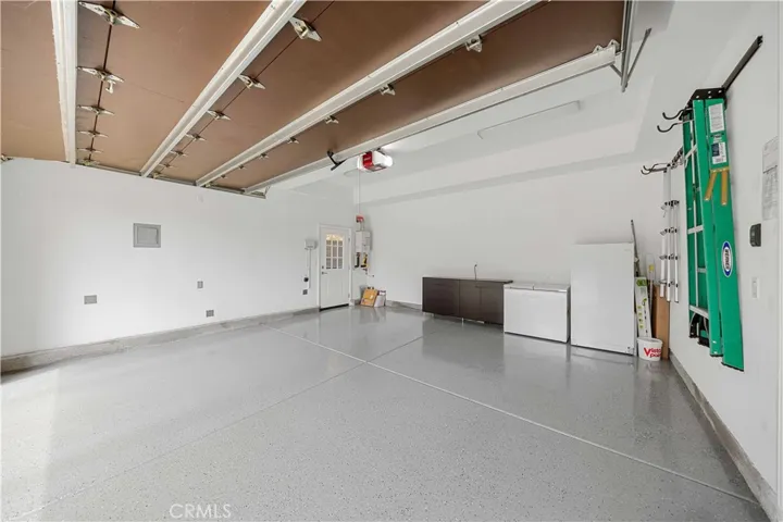 Two-car attached garage with epoxy flooring