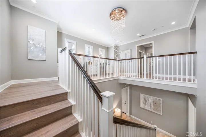 Upgraded hardwood flooring and lighting fixture
