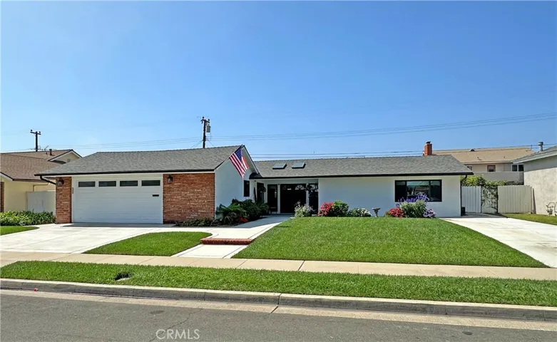 Large lot, double door covered entry with skylights and room for seating, a 2.5 car garage with lots of storage, and beautifully maintained front landscaping highlight the exterior of this amazing home with automatic lighting and automated sprinkler system.