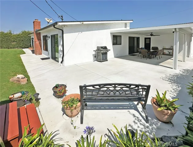Private backyard features plenty of space for easy and elegant entertaining.  Large, covered patio with LED lighting & ceiling fan, and dual pane sliders that open to seamlessly combine indoor & outdoor entertaining. Yard includes large spa for relaxing or entreating.  All new drainage system included.