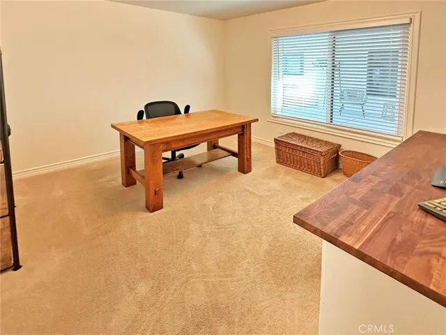 Fourth bedroom is roomy, light and bright.