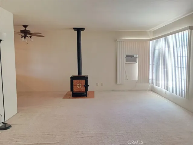overlooking the living adjacent to dining area on the left side with built-in cabinet